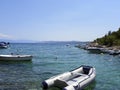 A rubber boat moored to the shore Royalty Free Stock Photo