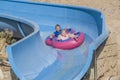 Rubber boat in a waterslide, image 1 Royalty Free Stock Photo