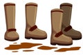 Rubber boot and puddle of mud. Waterproof farming gumboots. Dirty pair of footwear. Royalty Free Stock Photo