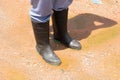 Rubber boots at a construction. Royalty Free Stock Photo