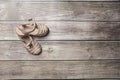 Rubber Brown baby girl sandals shoes on a wooden floor Royalty Free Stock Photo