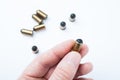 Rubber bullet in the hand Royalty Free Stock Photo