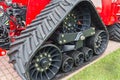 Rubber caterpillar farm tractor close up