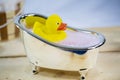 Rubber duck in bath, symbolic, voucher, wellness, wellness vouch Royalty Free Stock Photo