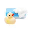 A rubber ducky and cyan bath sponge Royalty Free Stock Photo