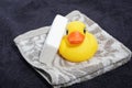 Rubber ducky, soap and towel Royalty Free Stock Photo