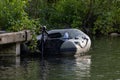 inflatable Rubber fishing boat on a tranquil lake shore. Royalty Free Stock Photo