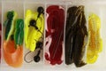 Rubber fishing lures and accessories in the box Royalty Free Stock Photo