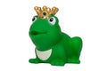 Rubber frog toys. Funny cute rubber green frog king or frog prince toy isolated on a white background. Macro