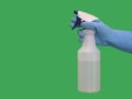 Rubber Gloved Hand Holding a Spray Bottle of Cleaning Solution Royalty Free Stock Photo