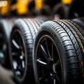 Rubber inventory Close up of bulk car tires in store, tire shop backdrop