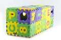 Rubber jigsaw puzzle box isolated. Royalty Free Stock Photo