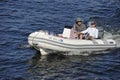 Rubber Motor Boat with Senior Couple