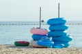 Rubber rings stacked at the beach.