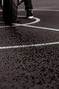 Black and white sepia tone motorcycle burnout portrait