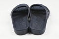 Rubber slippers. Pair of blue flip flops isolated on a white Royalty Free Stock Photo