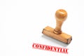 Rubber stamp with confidential  sign on white background Royalty Free Stock Photo