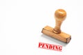 Rubber stamp with pending sign on white background Royalty Free Stock Photo