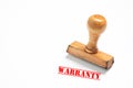 Rubber stamp with warranty  sign on white background Royalty Free Stock Photo