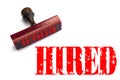 Rubber stamp with the word HIRED Royalty Free Stock Photo