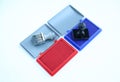 Rubber stamper and Red - Blue Ink cartridges on white background