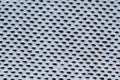 Rubber surface with uneven holes. white plastic texture with dots Royalty Free Stock Photo