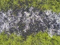 Rubbery base of soccer turf. Green synthetic artificial grass