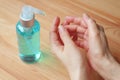 Rubbing Hands with Alcohol Cleansing Gel to Prevent the Infection Royalty Free Stock Photo