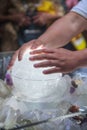 Rubbing quartz crystal ball orb, sphere is believed to eliminate bad vibes and to bring harmonious, calming energy to any space Royalty Free Stock Photo