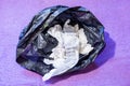 Rubbish bag with used tissues