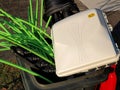 Rubbish bin full of NBN fibre optic cables and accessories