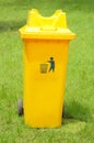 A rubbish bin in the park