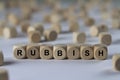 Rubbish - cube with letters, sign with wooden cubes