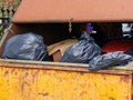 Rubbish and garbage in skip for disposal at dump site Royalty Free Stock Photo
