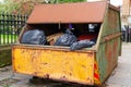 Rubbish and garbage in skip for disposal at dump site Royalty Free Stock Photo