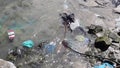 Footage of Rubbish being washed to the shore