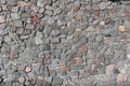 Rubble gray and brown stone wall, rubblework Royalty Free Stock Photo