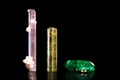 Rubellite, green and yellow Tourmaline, group of three mineral s Royalty Free Stock Photo