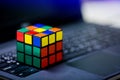 Rubik`s cube on laptop. techincal and business solving problem Royalty Free Stock Photo