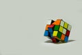 Rubik`s cube placed diagonally on a white background