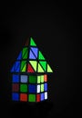 Rubik`s Cube and Triangular rubik`s Cube on black background . Royalty Free Stock Photo