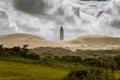 Rubjerg Knude Fyr, abandoned lighthouse among the sand dunes stands on the edge of the cliff
