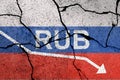 Ruble falls to historic lows. Flag of Russia painted on concrete wall with ruble sign