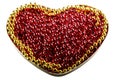 Ruby beads heart shaped. Yellow beads edging. Royalty Free Stock Photo