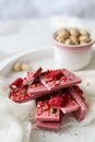 Ruby chocolate with fruits and pistachios Royalty Free Stock Photo