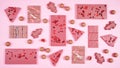 Ruby chocolate selection flat lay overhead on pink background.