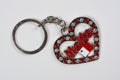 Ruby and diamond Maltese keyring. Royalty Free Stock Photo