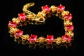 Ruby gold bracelet isolated