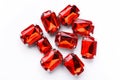 Ruby loose gemstones pile on white background Royalty Free Stock Photo