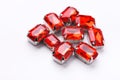 Ruby loose gemstones pile on white background Royalty Free Stock Photo